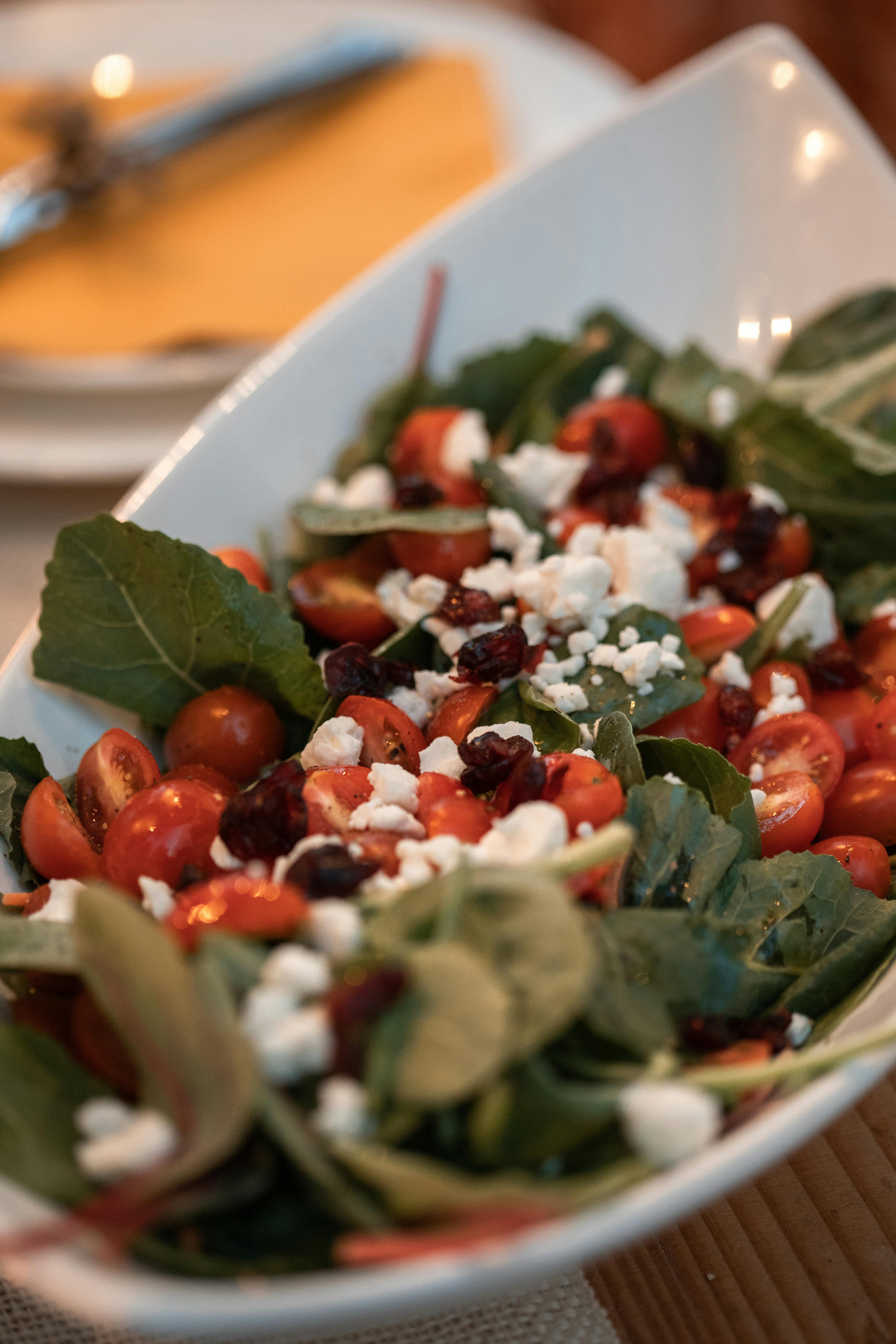 Fresh salad with tomatoes, greens and feta
